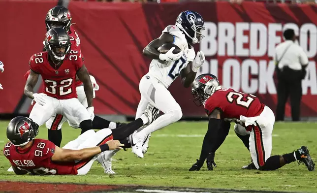 Tennessee Titans wide receiver Calvin Ridley runs against the Tampa Bay Buccaneers during the first half of an NFL preseason football game on Saturday, Aug. 9, 2025, in Tampa, Fla. (AP Photo/Jason Behnken)