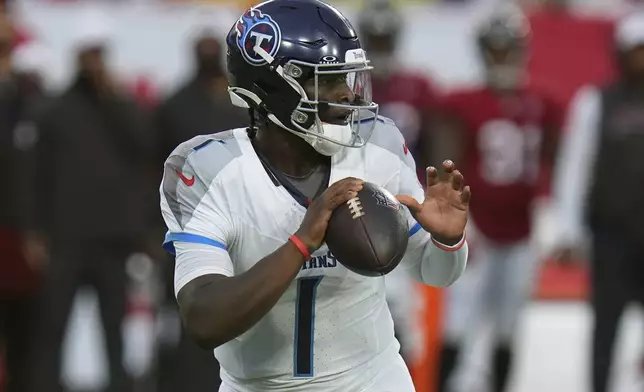 Tennessee Titans quarterback Cameron Ward passes against the Tampa Bay Buccaneers during the first half of an NFL preseason football game on Saturday, Aug. 9, 2025, in Tampa, Fla. (AP Photo/Chris O'Meara)