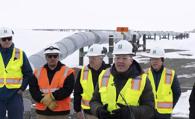 FILE - With the Trans-Alaska Pipeline in the background, EPA Administrator Lee Zeldin speaks during a news conference at the Pump Station 1 on Monday, June 2, 2025, located near Deadhorse, Alaska, on the state's North Slope. (AP Photo/Jenny Kane, File)
