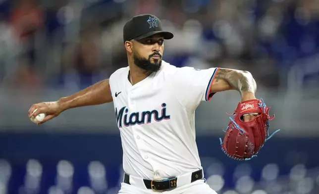 Miami Marlins starting pitcher Sandy Alcantara (22) pitches in the second inning of a baseball game against the Houston Astros, Monday, Aug. 4, 2025, in Miami. (AP Photo/Rebecca Blackwell)