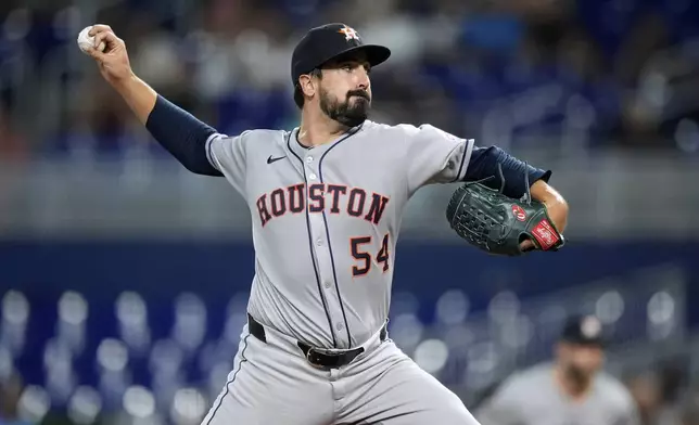 Houston Astros starting pitcher Jason Alexander (54) pitches in the first inning of a baseball game against the Miami Marlins, Monday, Aug. 4, 2025, in Miami. (AP Photo/Rebecca Blackwell)