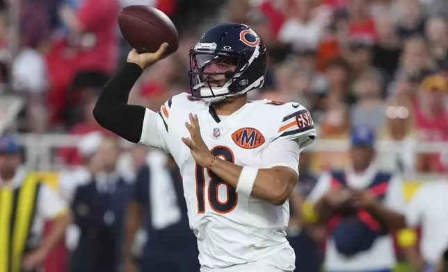 Chicago Bears quarterback Caleb Williams throws during the first half of a preseason NFL football game against the Kansas City Chiefs Friday, Aug. 22, 2025, in Kansas City, Mo. (AP Photo/Ed Zurga)