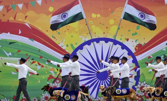 Assam Police dog squads take part in a parade during the country's Independence Day celebrations in Guwahati, Friday, Aug. 15, 2025. (AP Photo/Anupam Nath)