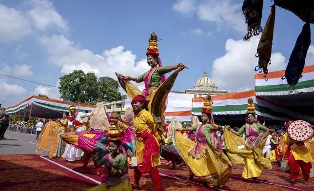 Artists perform during Independence Day celebrations in Lucknow, Uttar Pradesh state, India, Friday, Aug. 15, 2025. (AP Photo/Rajesh Kumar Singh)