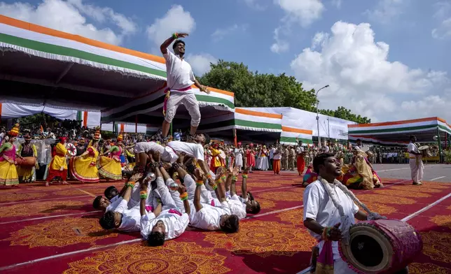 Artists perform during Independence Day celebrations in Lucknow, Uttar Pradesh state, India, Friday, Aug. 15, 2025. (AP Photo/Rajesh Kumar Singh)