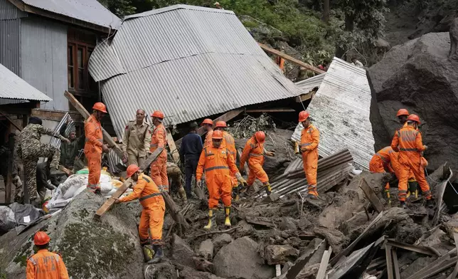 India's National Disaster Response Force (NDRF) personnel carry out a rescue operation after Thursday's flash floods, in Chositi village, Kishtwar district, Indian-controlled Kashmir, Friday, Aug. 15, 2025. (AP Photo/Channi Anand)