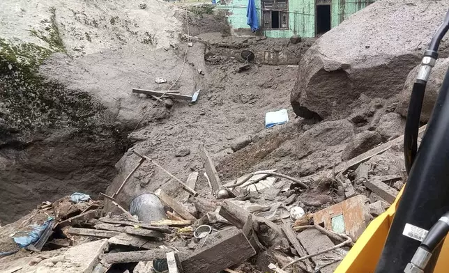 A building damaged in flash floods caused by torrential rains is seen in a remote, mountainous village in Chositi area, Indian controlled Kashmir, Thursday, Aug. 14, 2025. (AP Photo)