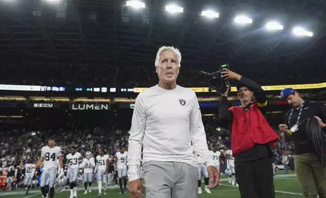 Las Vegas Raiders head coach Pete Carroll leaves the field after an NFL preseason football game against the Seattle Seahawks, Thursday, Aug. 7, 2025, in Seattle. (AP Photo/Lindsey Wasson)