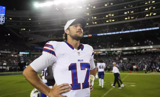 Buffalo Bills quarterback Josh Allen stands on the field after a preseason NFL football game against the Chicago Bears Sunday, Aug. 17, 2025, in Chicago. (AP Photo/Erin Hooley)