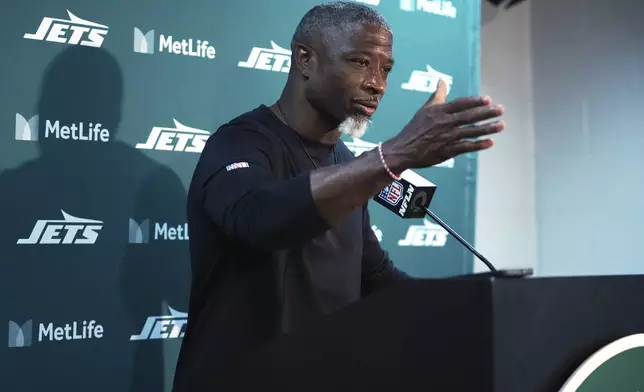 New York Jets head coach Aaron Glenn talks to reporters after a preseason NFL football game against the Philadelphia Eagles in East Rutherford, N.J., Friday, Aug. 22, 2025. (AP Photo/Frank Franklin)