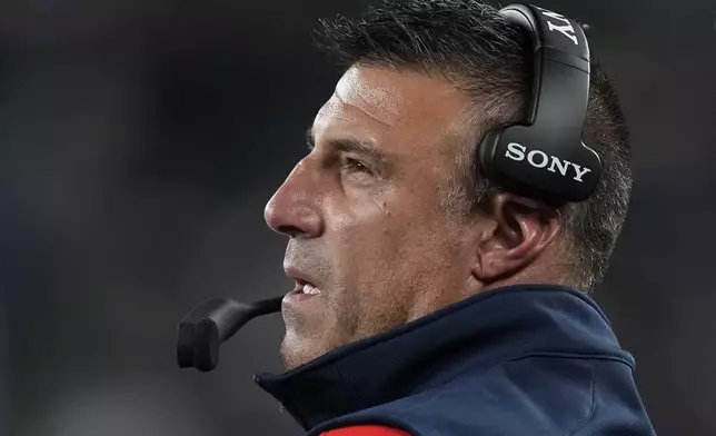 New England Patriots head coach Mike Vrabel watches play against the New York Giants from the sidelines during the second quarter of an NFL football game, Thursday, Aug. 21, 2025, in East Rutherford, N.J. (AP Photo/Frank Franklin II)