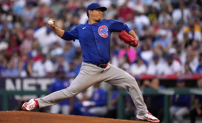 Chicago Cubs starting pitcher Javier Assad throws to the plate during the first inning of a baseball game against the Los Angeles Angels, Friday, Aug. 22, 2025, in Anaheim, Calif. (AP Photo/Mark J. Terrill)