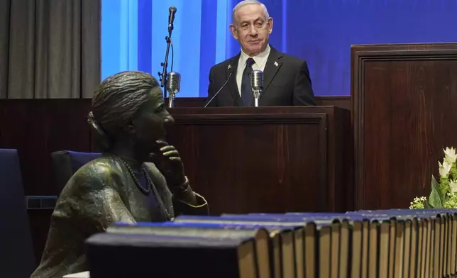 Israeli Prime Minister Benjamin Netanyahu speaks at the opening ceremony of the Knesset Museum in the old building of the Israeli parliament, in Jerusalem, Monday, Aug.11, 2025. (AP Photo/Ohad Zwigenberg, Pool)