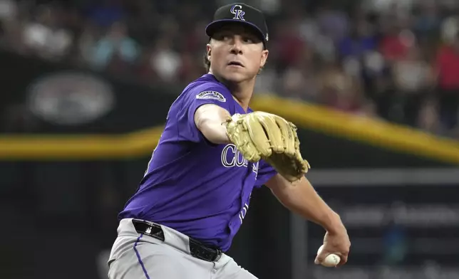 Colorado Rockies pitcher Ryan Rolison throws against the Arizona Diamondbacks in the fifth inning of a baseball game, Sunday, Aug 10, 2025, in Phoenix. (AP Photo/Rick Scuteri)