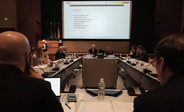 FILE - CDC participants listen to the speakers during a meeting of the Advisory Committee in Immunization Practices, Wednesday, June 25, 2025, in Atlanta. (AP Photo/Mike Stewart, File)
