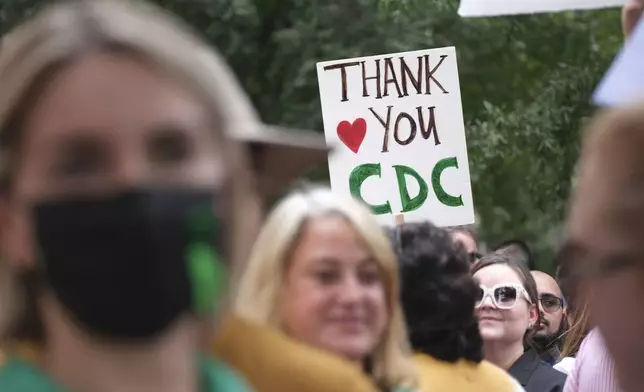 Workers and supporters gather to rally for departing scientific leaders at the Centers for Disease Control and Prevention outside the CDC headquarters, Thursday, Aug. 28, 2025, in Atlanta. (AP Photo/Ben Gray)