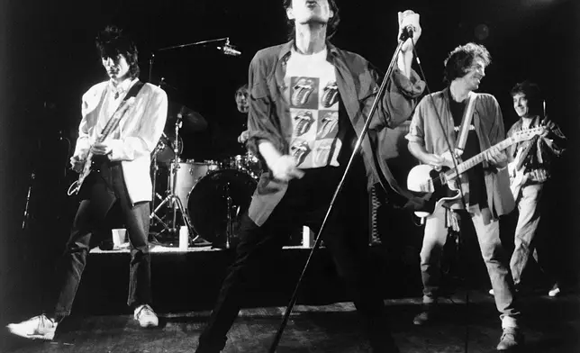 FILE - The Rolling Stones perform during an impromptu concert at the Toad's Place nightclub in New Haven, Conn., early Sunday, Aug. 13, 1989. (AP Photo/Dimo Safari, File)