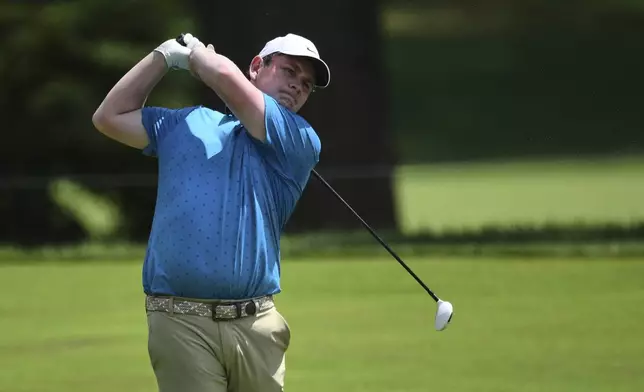 Robert MacIntyre, of Scotland, hits from the fairway on the 16th hole during the second round of the BMW Championship golf tournament, Friday, Aug. 15, 2025, in Owings Mills, Md. (AP Photo/Nick Wass)