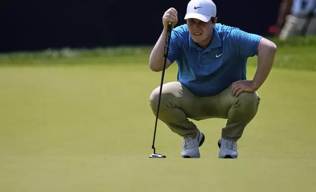 Robert MacIntyre, of Scotland, gauges his putt on the 16th hole during the second round of the BMW Championship golf tournament Friday, Aug. 15, 2025, in Owings Mills, Md. (AP Photo/Stephanie Scarbrough)