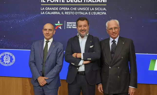 From left: Italian undersecretary Alessandro Morelli, Italian Vice Premier and Minister of Transport Matteo Salvini and businessman Pietro Ciucci pose for photographers at the end of a press conference in Rome, Wednesday, Aug. 6, 2025. (AP Photo/Andrew Medichini)