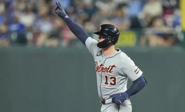 Detroit Tigers' Dillon Dingler runs the bases after hitting a solo home run during the eighth inning of a baseball game against the Kansas City Royals, Friday, Aug. 29, 2025, in Kansas City, Mo. (AP Photo/Charlie Riedel)
