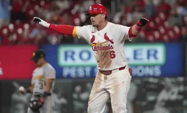 St. Louis Cardinals' Nolan Gorman celebrates after hitting an RBI double during the fifth inning of a baseball game against the Pittsburgh Pirates Monday, Aug. 25, 2025, in St. Louis. (AP Photo/Jeff Roberson)