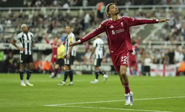 Liverpool's Hugo Ekitike celebrates after scoring during the Premier League soccer match between Newcastle and Liverpool in Newcastle, England, Monday, Aug. 25, 2025. (AP Photo/Jon Super)