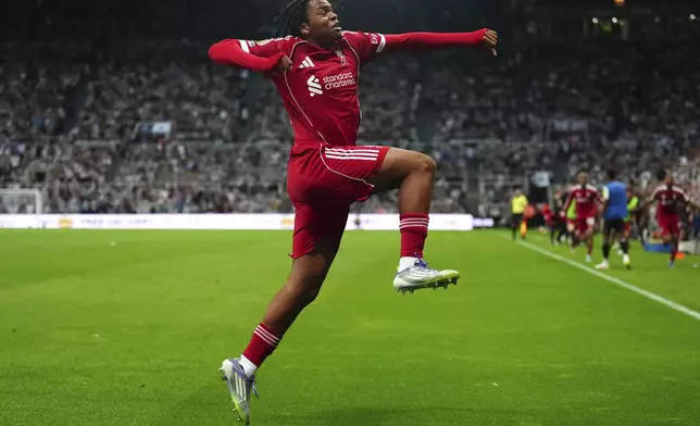 Liverpool's Rio Ngumoha celebrates after scoring his side's third goal during the English Premier League soccer match between Liverpool and Newcastle United at St James' Park, Newcastle, England, Monday Aug. 25, 2025. (Owen Humphreys/PA via AP)