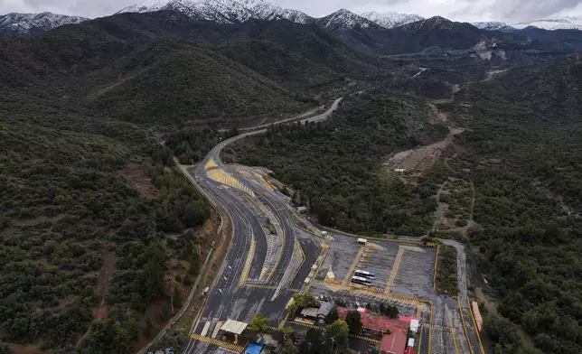 An aerial view of El Teniente copper mine, operated by Codelco, where a cave-in killed one worker and trapped five others underground, halting operations in Rancagua, Chile, Saturday, Aug. 2, 2025. (AP Photo/Esteban Felix)