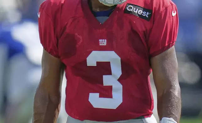 New York Giants quarterback Russell Wilson participates during a joint NFL football practice with the New York Jets in East Rutherford, N.J., Wednesday, Aug. 13, 2025. (AP Photo/Seth Wenig)