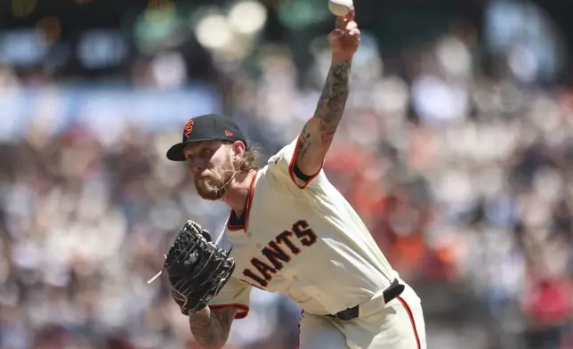 San Francisco Giants starting pitcher Carson Whisenhunt throws to a Washington Nationals batter during the first inning of a baseball game Saturday, Aug. 9, 2025, in West Sacramento, Calif. (AP Photo/Scott Marshall)