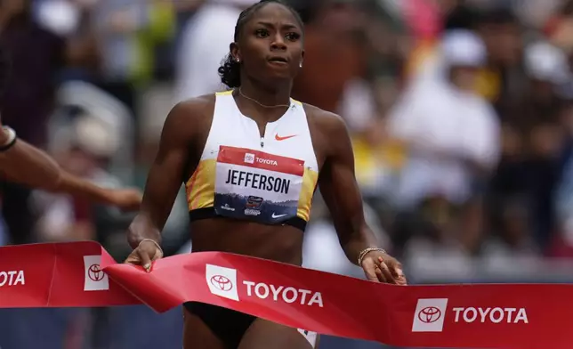 Melissa Jefferson-Wooden wins the women's 200-meter final at the U.S. Championships athletics meet in Eugene, Ore., Sunday, Aug. 3, 2025. (AP Photo/Abbie Parr)
