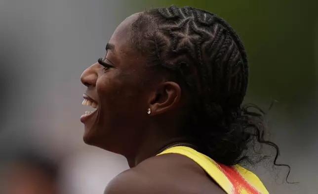 Melissa Jefferson-Wooden reacts after winning the women's 200-meter final at the U.S. Championships athletics meet in Eugene, Ore., Sunday, Aug. 3, 2025. (AP Photo/Abbie Parr)