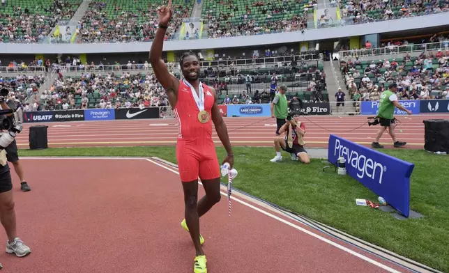 Noah Lyles reacts after winning the men's 200-meter finals during the U.S. Championships athletics meet in Eugene, Ore.,Sunday, Aug. 3, 2025. (AP Photo/Ashley Landis)