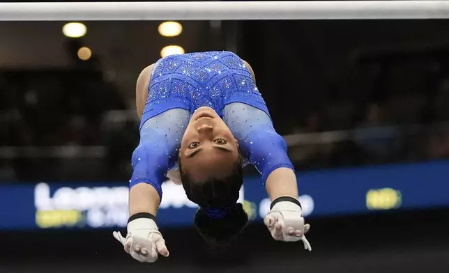 Hezly Rivera of WOGA competes on the uneven bars during the senior women's finals of the U.S. Gymnastics Championships in New Orleans, Sunday, Aug. 10, 2025. (AP Photo/Gerald Herbert)
