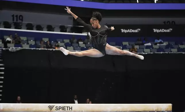 Skye Blakely of the University of Florida competes on the balance beam during the senior women's finals of the U.S. Gymnastics Championships in New Orleans, Sunday, Aug. 10, 2025. (AP Photo/Gerald Herbert)