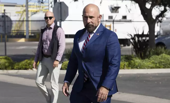 Florida Lt. Gov. Jay Collins arrives for a news conference, Thursday, Aug. 21, 2025, in Stockton, Calif. Collins and law enforcement escorted Harjinder Singh to an airplane after the press conference. (AP Photo/Benjamin Fanjoy)