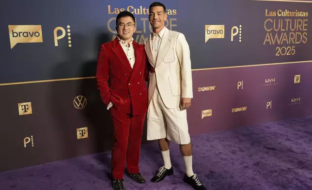 FILE - Co-hosts Bowen Yang, left, and Matt Rogers pose together at Las Culturistas Culture Awards on Thursday, July 17, 2025, at The Orpheum Theatre in Los Angeles. (AP Photo/Chris Pizzello, File)