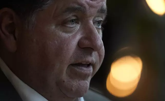 Illinois Gov. J.B. Pritzker sits for an interview with the Associated Press, Wednesday, Aug. 27, 2025, in the Bronzeville neighborhood of Chicago. (AP Photo/Erin Hooley)