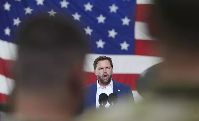 Vice President JD Vance speaks during a visit to airmen and family members of the 501st combat support wing at Royal Air Force Fairford in Gloucestershire, England, Wednesday, Aug. 13, 2025. (AP Photo/Frank Augstein)