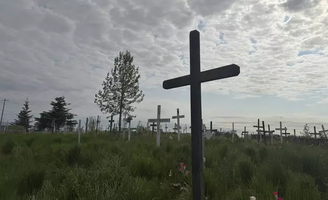 Crosses are seen at the Ridgecrest Memorial Cemetery in Bethel, Alaska, on June 17, 2025. (AP Photo/Mark Thiessen)