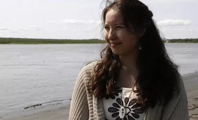 Sophie Swope, executive director of the Mother Kuskokwim Tribal Coalition, poses for a portrait on the banks of the Kuskokwim River in Bethel, Alaska, on June 17, 2025. (AP Photo/Mark Thiessen)