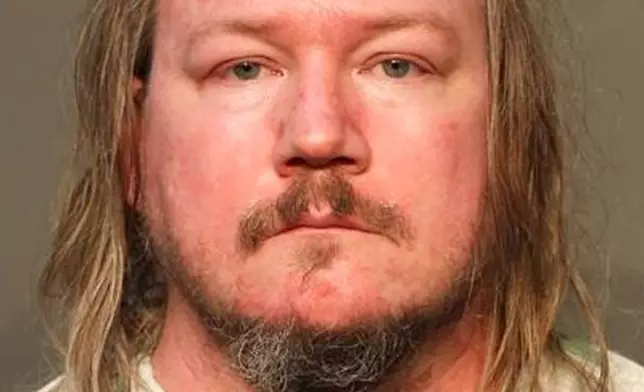 This booking photo provided by the Des Moines, Iowa, Polk County Sheriff’s Office shows Sean Gardner on Thursday, Aug. 14, 2025. (Polk County Sheriff’s Office via AP)