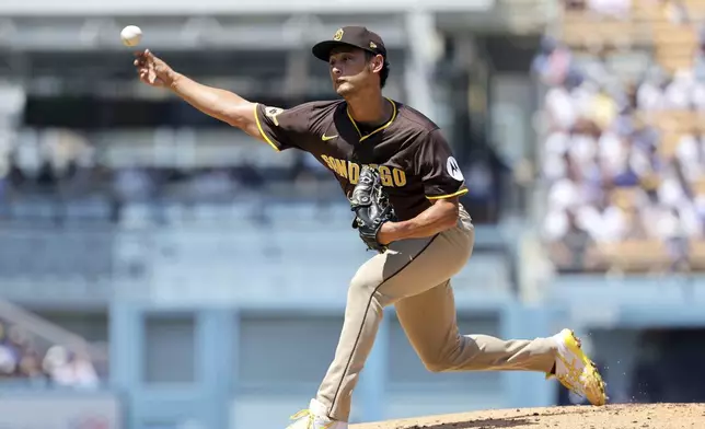 San Diego Padres pitcher Yu Darvish delivers against the Los Angeles Dodgers during the second inning of a baseball game, Sunday, Aug. 17, 2025, in Los Angeles. (AP Photo/Kevork Djansezian)