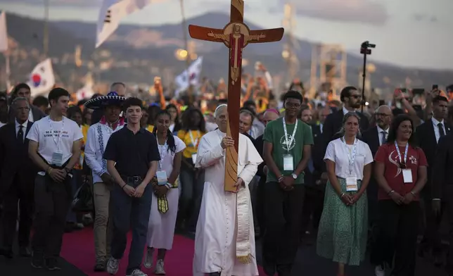 Pope Leo XIV holds prayer vigil with young people participating in the Youths Jubilee at the Tor Vergata field in Rome, Saturday, Aug. 2, 2025. (AP Photo/Andrew Medichini)