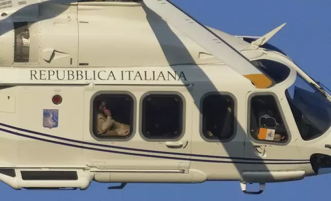 The helicopter carrying Pope Leo XIV arrives for the prayer vigil with young people participating in the Youths Jubilee at the Tor Vergata field in Rome, Saturday, Aug. 2, 2025. (AP Photo/Gregorio Borgia)