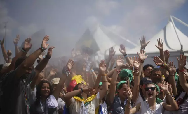 Young people participate in the Youths Jubilee at the Tor Vergata field in Rome, Saturday, Aug. 2, 2025. (AP Photo/Andrew Medichini)