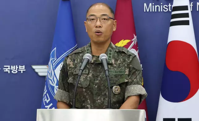 Col. Lee Sung-jun, left, public affairs director of South Korea's Joint Chiefs of Staff attends a press briefing of Ulchi Freedom Shield 2025 exercise at the Defense Ministry in Seoul Thursday, Aug. 7, 2025. (Chung Sung-Jun/Pool Photo via AP)