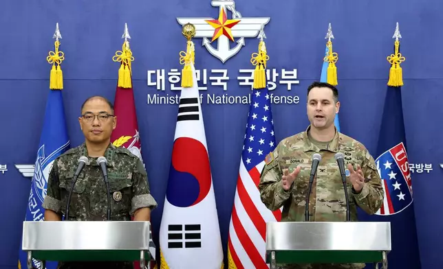 Col. Lee Sung-jun, left, public affairs director of South Korea's Joint Chiefs of Staff and Col. Ryan Donald, public affairs director of the United Nations Command (UNC), Combined Forces Command (CFC), and United States Forces Korea (USFK) attend a press briefing of Ulchi Freedom Shield 2025 exercise at the Defense Ministry in Seoul Thursday, Aug. 7, 2025. (Chung Sung-Jun/Pool Photo via AP)