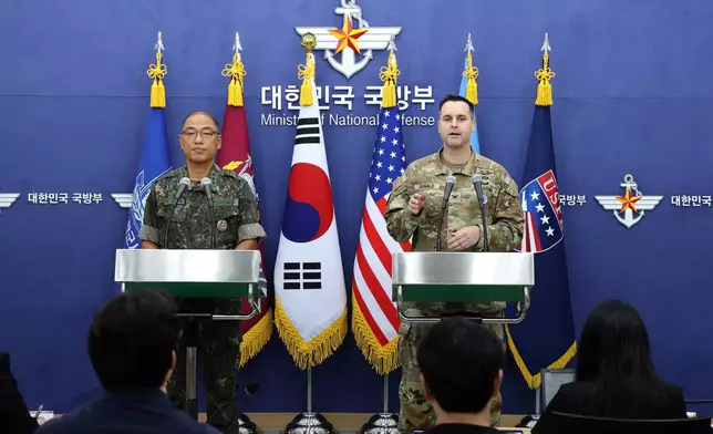 Col. Lee Sung-jun, left, public affairs director of South Korea's Joint Chiefs of Staff and Col. Ryan Donald, public affairs director of the United Nations Command (UNC), Combined Forces Command (CFC), and United States Forces Korea (USFK) attend a press briefing of Ulchi Freedom Shield 2025 exercise at the Defense Ministry in Seoul Thursday, Aug. 7, 2025. (Chung Sung-Jun/Pool Photo via AP)